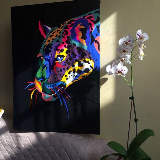 leopardo arcoiris — val